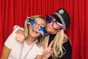 two-girls-in-photo-booth-768x512